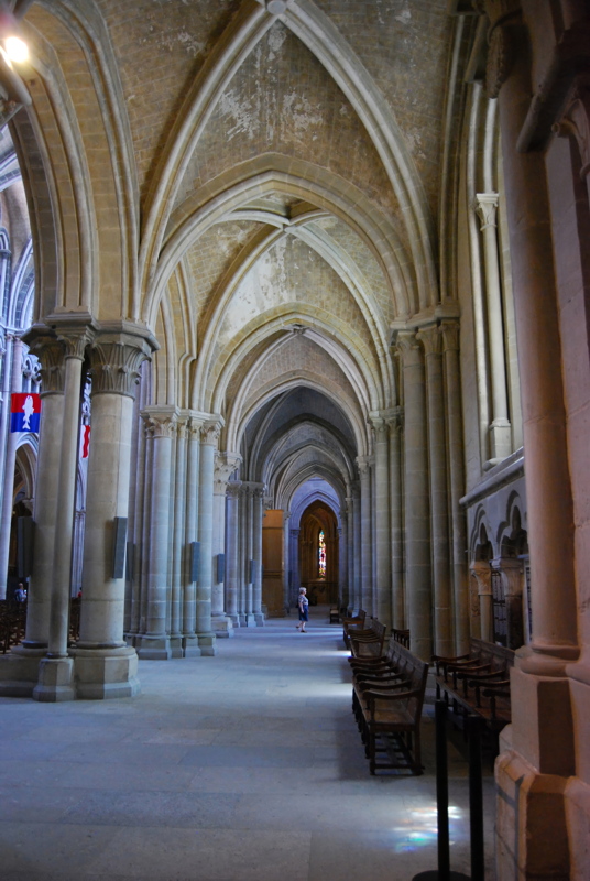 6 - The interior arcade and vaulted ceiling of the historic Lausanne Cathedral located in Lausanne